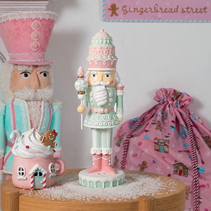 Sleigh Bells Pastel Cupcake Nutcracker
