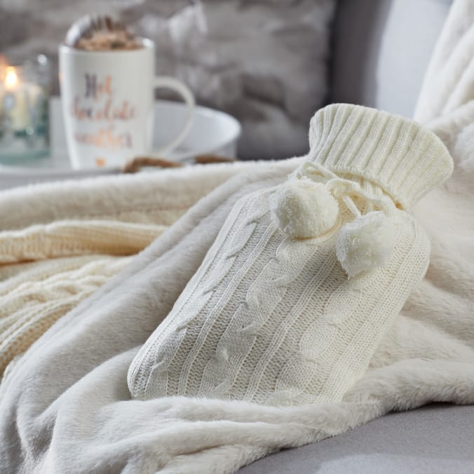 Warm At Heart: Knitted Hot Water Bottle - Cream