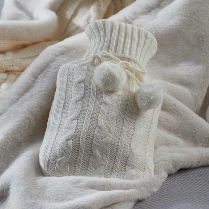 Warm At Heart: Knitted Hot Water Bottle - Cream